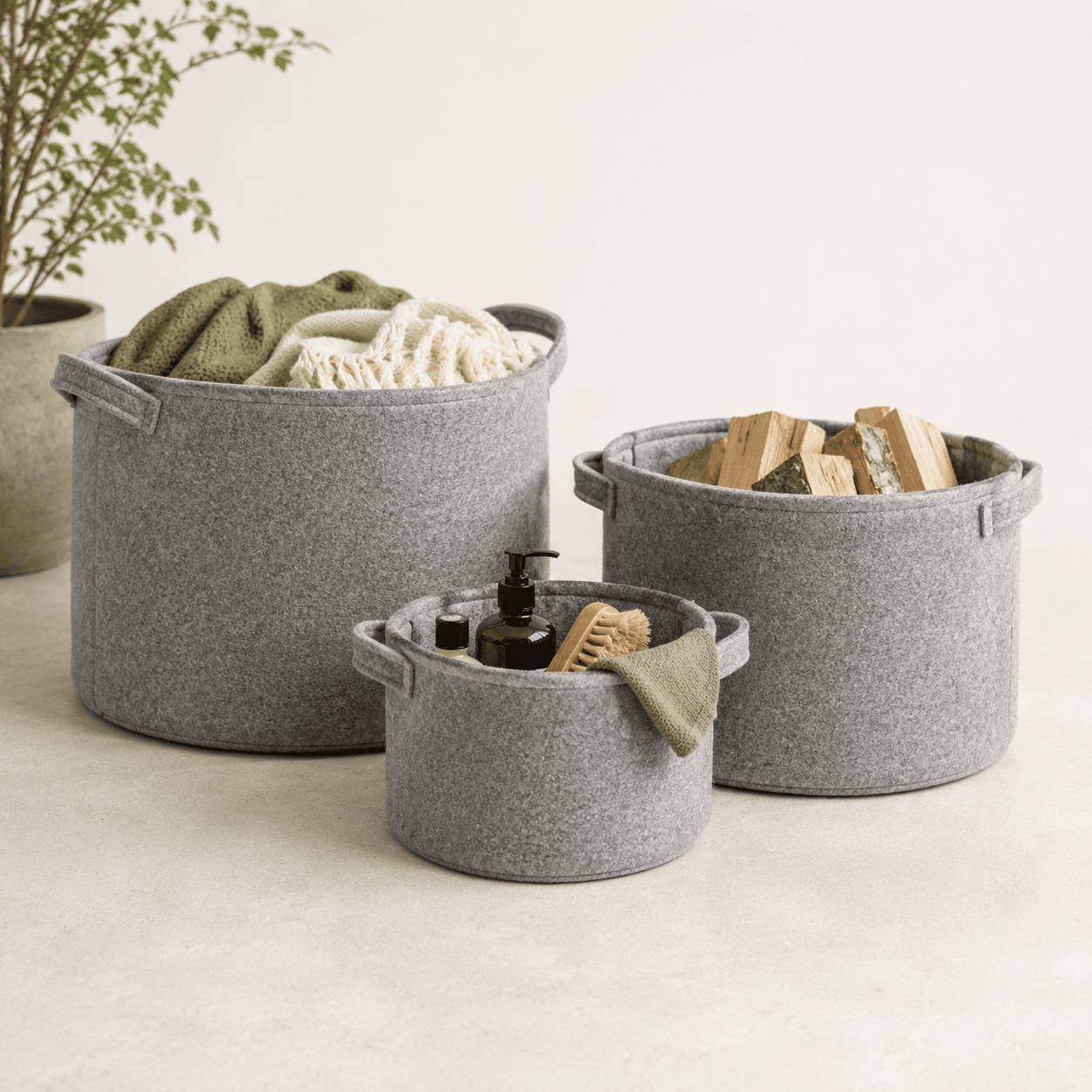 Felt Storage Baskets (Set of 3) — Soft-sided baskets that keep shelves looking calm.